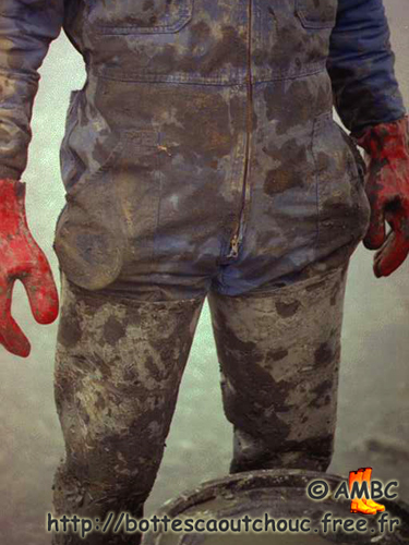 Wearing very muddy overalls.