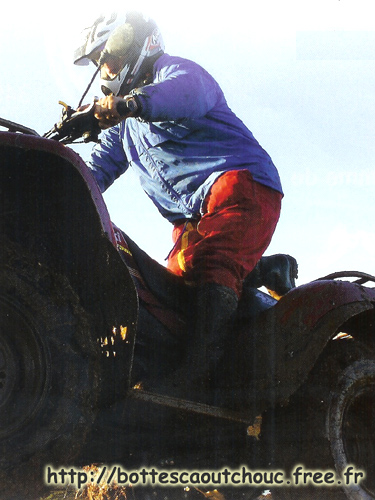  Wearing rubber boots on a quad. 