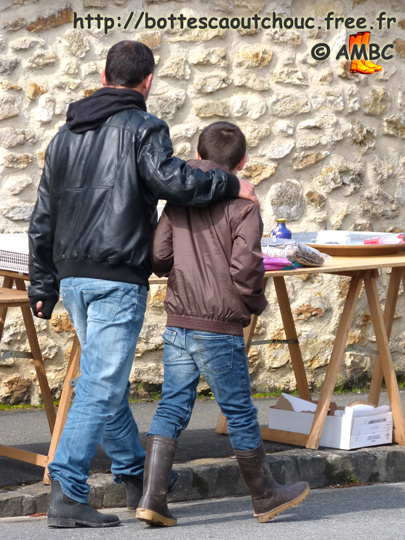 Father and son in rubber boots in Chailly en Bière, France. Gummistiefel, botas de gomma, rubber laarzen, stivali di gomma, wellies, bottes caoutchouc, May 2013.
