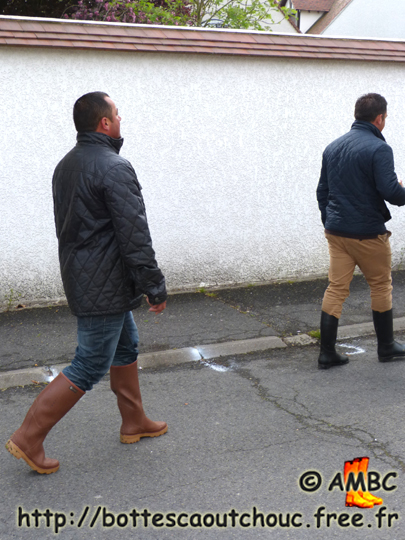 Wearing openly rubber boots  in Chailly en Bière streets, France. Gummistiefel, botas de gomma, rubber laarzen, stivali di gomma, wellies, bottes caoutchouc, May 2013.