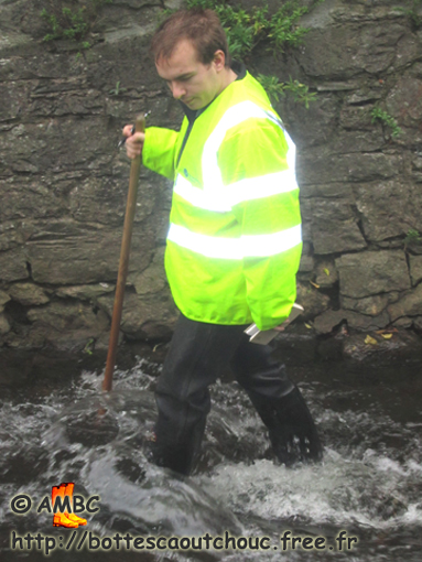 Environment agent wearing waders in Newton-Abbot, U.K., november 2011.