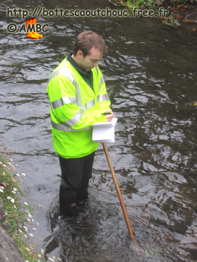 Environment agent wearing waders in Newton-Abbot, U.K., november 2011.