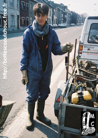 Geoffray in blue overalls & PVC boots.