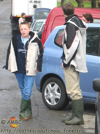 Young Belgian guys wearing rubber boots ;  Soumagne, Belgium, Oct. 2003. Gummistiefel, rubber laarzen, stivali di gomma, bottes caoutchouc.