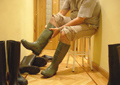 Andy enfile ses bottes