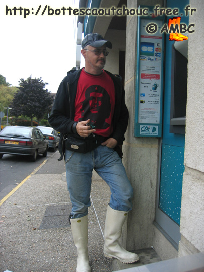 Pascal at the cash dispender, wearing white Superga boots, 2005.