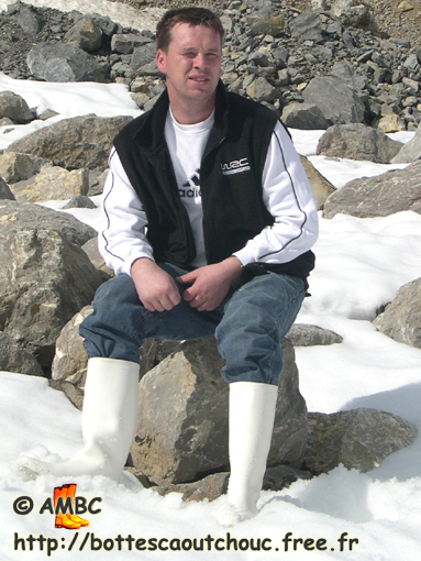 CHRISTOPHE IN THE SNOW IN WHITE WELLIES.