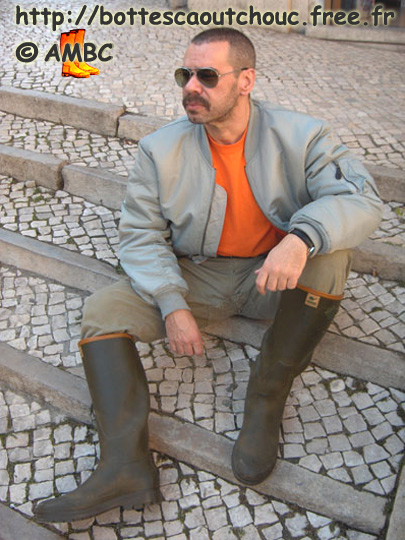 Wearing old Le Chameau rubber boots, in Lisbon, 2005. 