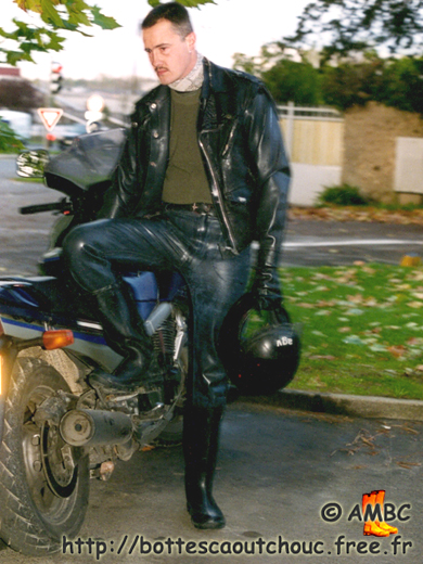 Pascal wearing rubber on a friend's motorbike, 1995. Gummistiefel, rubber boots, bottes caoutchouc.