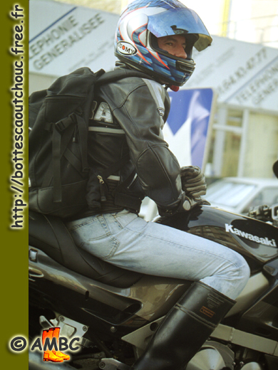 Hughes, wearing Baudou rubber boots on his Kawasaki motorbike, 2001. Gummistiefel, rubber boots, bottes caoutchouc.