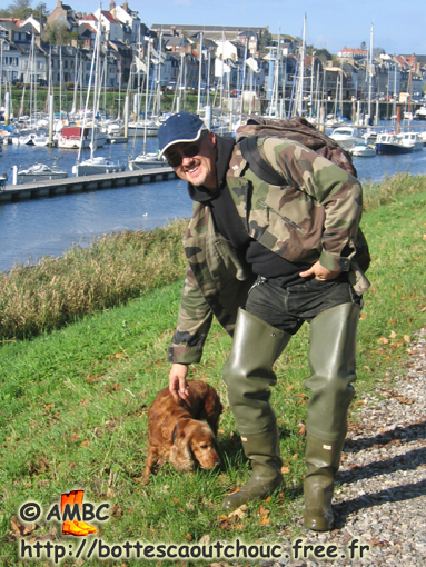 Pascal wearing waders, with a cocker, Somme, France, 2008.