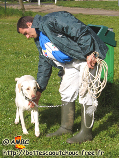 Young guy wearing PVC wellies, Dammarie Les Lys, Seine & Marne, France, 2005. Rubber boots, Gummistiefel, galochas, stivali di gomma.