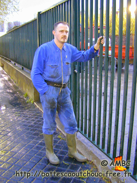 Wearing blue overalls