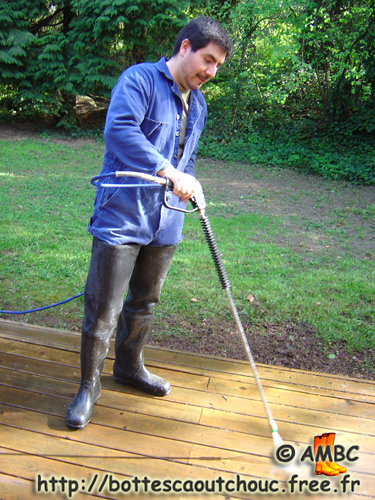 Fernando washing his terrace, USA.