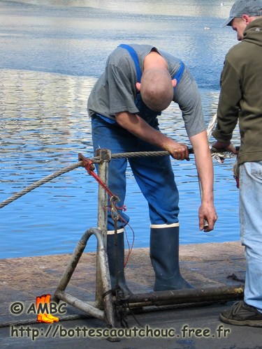 Young worker at Cherbourg harbour, France, 2004.