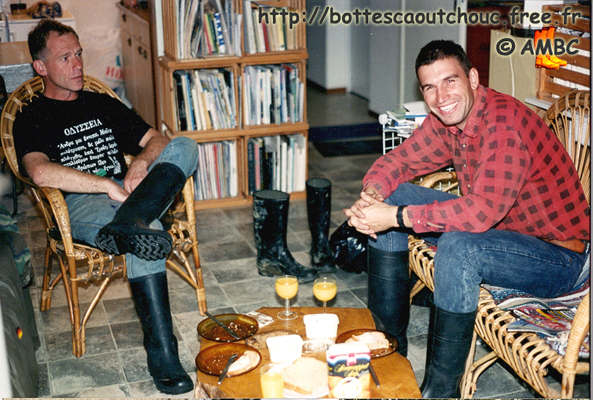 Rudi & Miklos wearing unlined black rubber boots, in the Netherlands; around 2000.