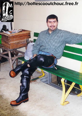 In waders on the bench