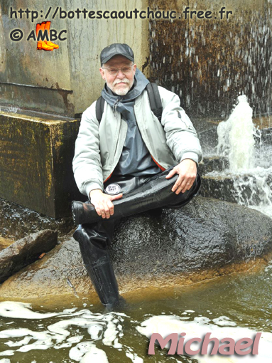 Wearing waders in the fountain. Gummistiefel. June 2011.