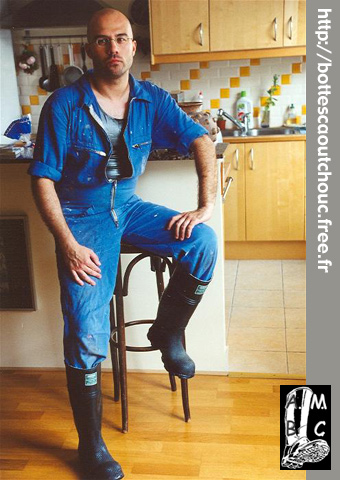 Greg in blue overalls & rubber boots.