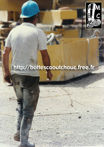 Blue hard hat & Aigle rubber boots.
