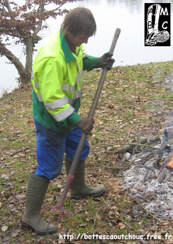 Working with the fire, wearing PVC boots