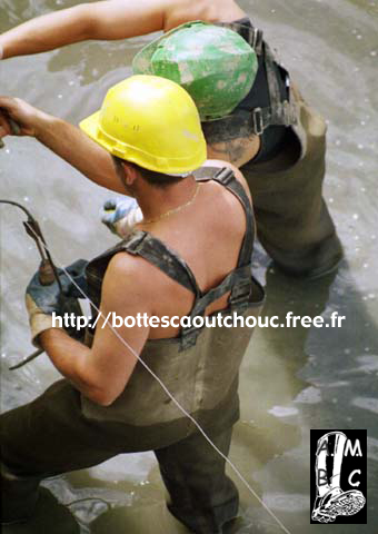 Workers in the harbour, France, 2003.