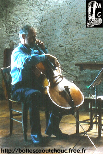 Michael playing cello with Baudou rubber boots.
