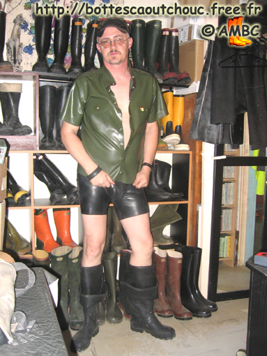Pascal wearing rubber in his flat. Before The House of the Rubber Boot, France, 2005.
