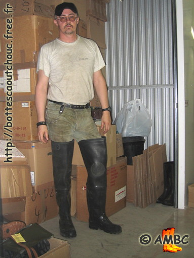 Pascal wearing Nokia waders, is checking the stock. Before The House of the Rubber Boot, France, 2005.