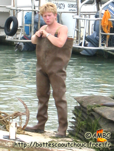 Wearing Le Chameau waders on the boat.
