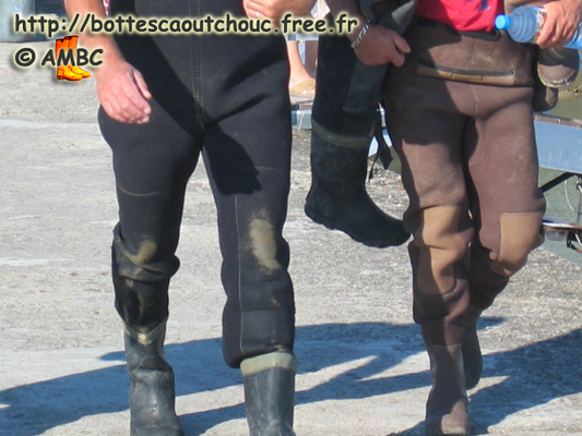 Wearing chest waders on the port; France, 2003.