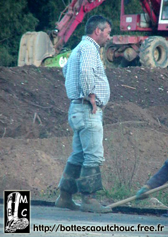 Supervisor wearing waders