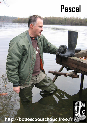 At the Seine river, in PVC waders