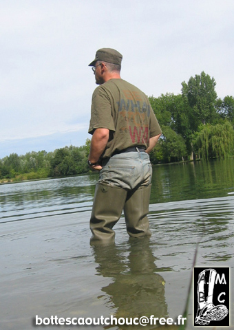 In waders in the Seine river