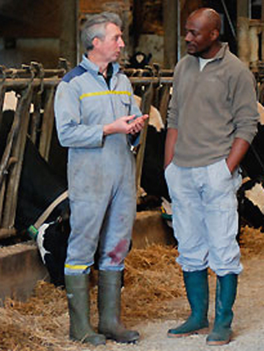 Harry Roselmack, French Journalist, with farmers, January 2011.