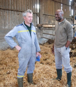 Harry Roselmack, French Journalist, with farmers, January 2011.