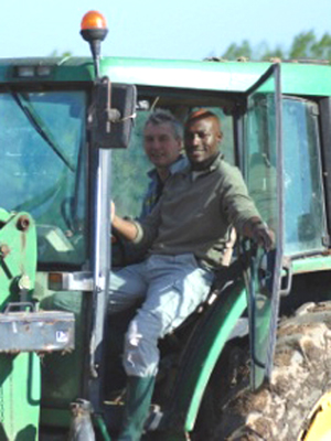 Harry Roselmack, French Journalist, with farmers, January 2011.