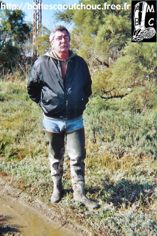 Paul is walking for a long trip in waders.