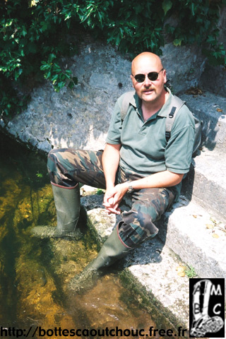 Wearing Tretorn rubber boots.