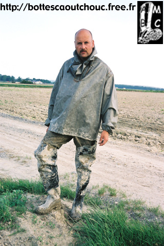 Wearing NBC gear & waders in the fields, 2003.