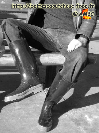 A dropout in rubber boots, in Lyon, France, 2003.