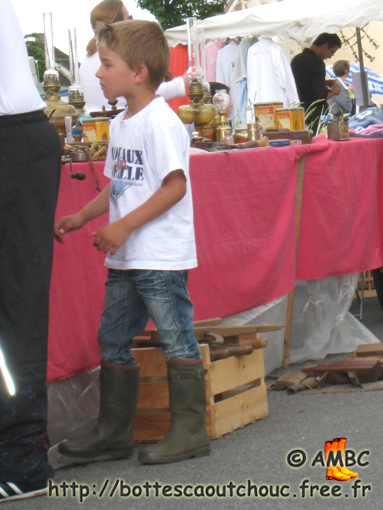 Kid in Aigle wellies; 2009.