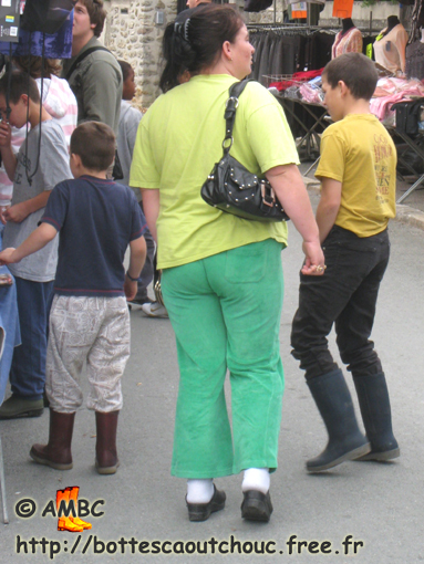 Three kids in wellies; France, 2009.