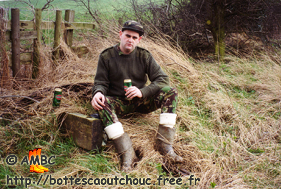 In military gear & turned down boots, 2006.