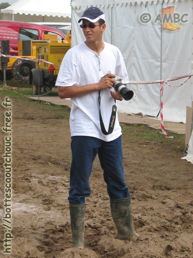 Young photographer with PVC boots. Gummistiefel, stivali di gomma, 2005.