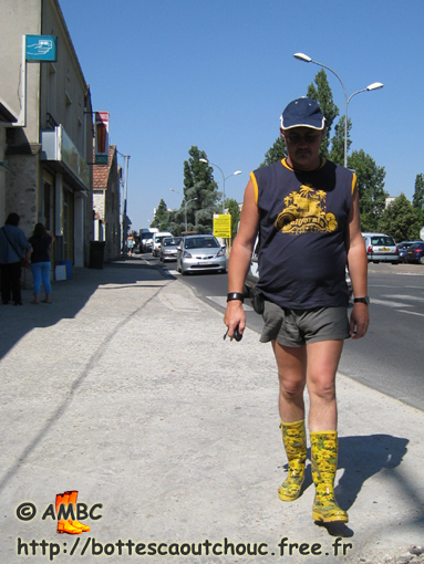 Pascal in shorts & wellies with yellow flowers; rubber boots, Summer 2008.
