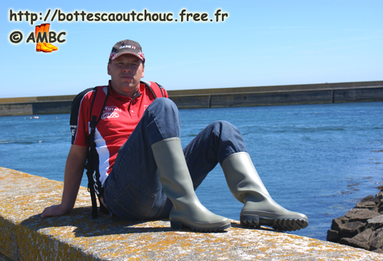 At the Ocean, wearing PVC boots, 2008. Gummistiefel, bottes caoutchouc.