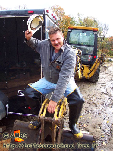 Bill in waders on a building site, 2006. Gummi Waders, cuissardes caoutchouc, rubber hip boots.