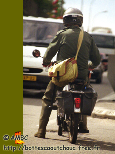 Wearing waders on the bike, in Pontarlier, 2002. Gummi Waders, cuissardes caoutchouc, rubber hip boots.