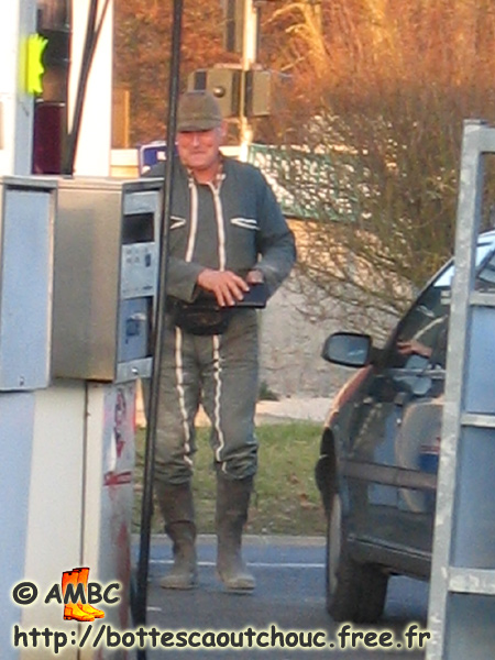 Paying for some oil, Montcourt, France, 2006.